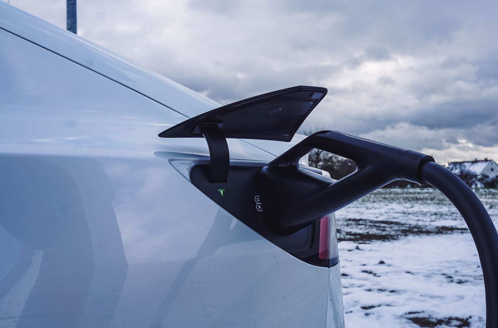 Type 2 charging connector plugged into an EV charge port